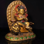 Exquisitely Crafted Aged Copper Polychrome Manjushri Bodhisattva in Childlike Form - Image 2