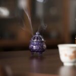 Archaistic Mini Tripod Brass Censer with Vintage Purple Glaze, Inscribed with the Five Blessings at the Base and Embodying the Auspicious Omen of Purple Qi Coming from the East.