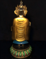 Standing Candana Buddha on lotus plinth with hand-painted green, red and blue mineral pigments
