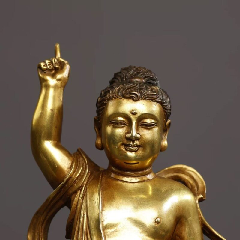 Full front and rear view of a gilded bronze Prince Siddhartha statue with refined carving on hair, robe and ribbon