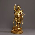 Gilded bronze Seven-Step Buddha showing Siddhartha’s heaven-earth gesture at his sacred birth