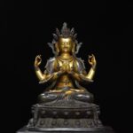 Large Cast Bronze Four-Armed Avalokitesvara Bodhisattva, Aged Patina with Partial Gild Finish, Cross-Legged Seated on Double-Carved Lotus Pedestal
