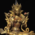 Close-up photo of Green Tara statue