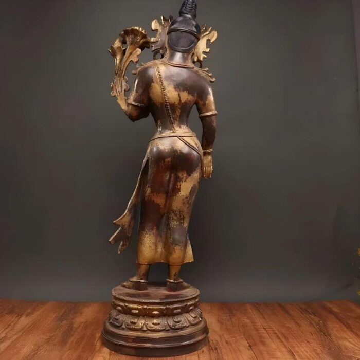 a tall standing finish of Jampa/Maitreya, with partial selective gilding & artificially aged worn patina