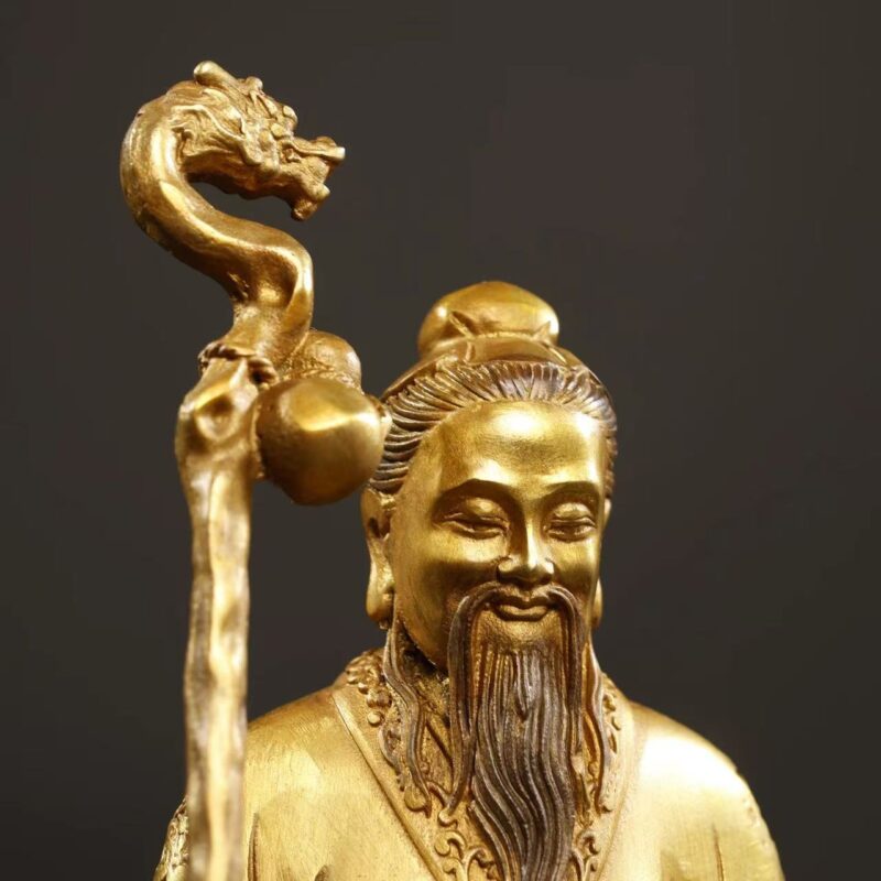 Close-up of Sun Simiao, gilding bronze statue of the King of Medicine