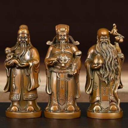 Three antique bronze statues of Fu Lu Shou standing together, representing fortune, prosperity, and longevity in Chinese culture